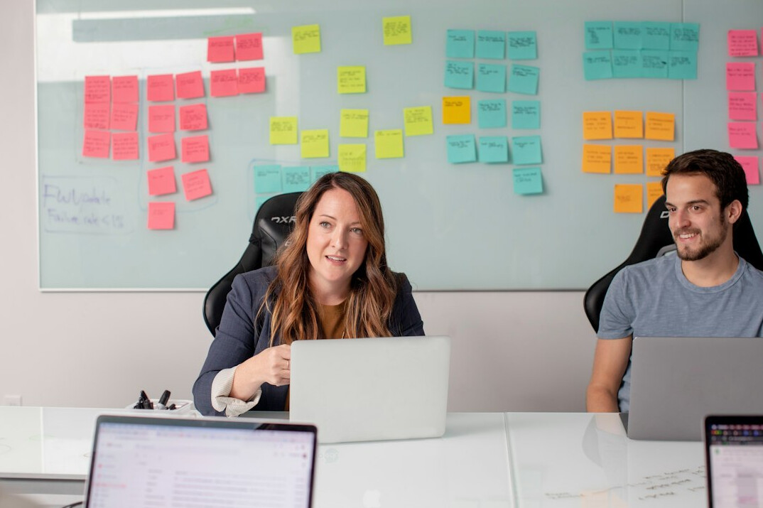 business team collaborating on software