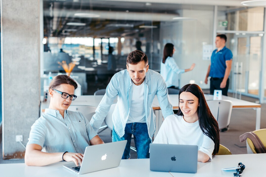 programmers collaborating in office